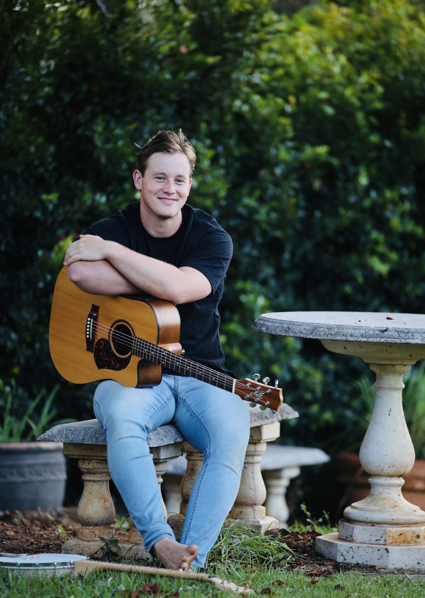Mac Vines Retrospective, Dayboro Open Night 2025 2 Will Outidge sitting with his guitar